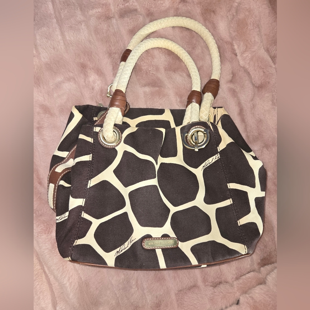 Michael Kors giraffe print bag.